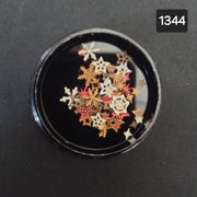 Golden snowflakes and stars nail art.